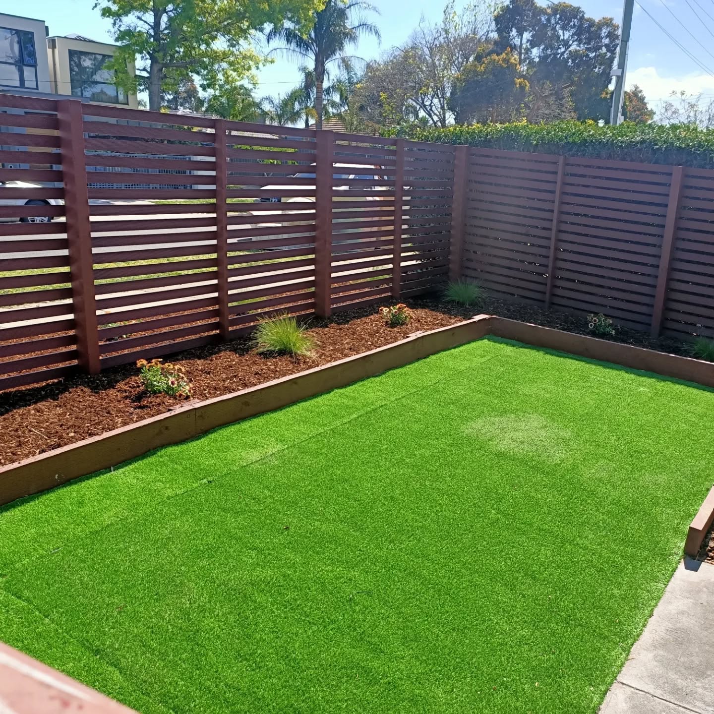 Replaced synthetic grass, paint fence, planting to get the house ready for sale