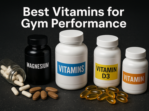 Various vitamin supplement bottles and capsules arranged on a dark fitness surface