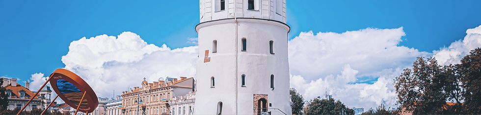 a white building with a clock tower_edited_edited.png