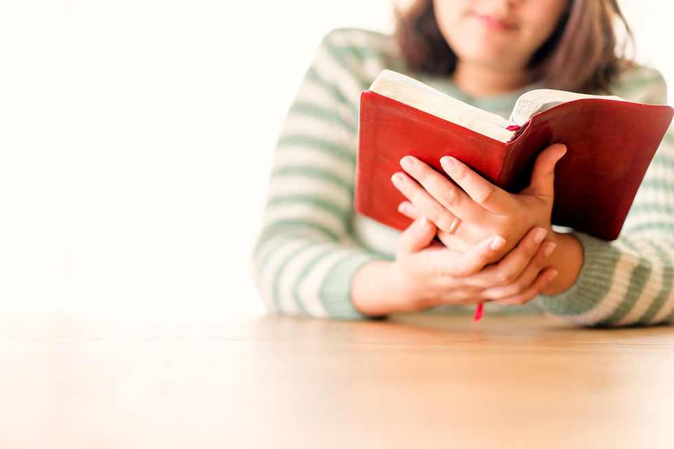 Woman reading the bible