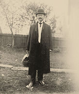 physician standing with medical bag