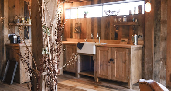 Interior picture of wooden cabin kitchen.