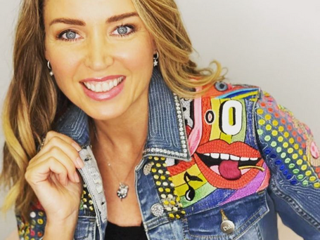 Dannii Minogue wearing a personalised denim jacket.