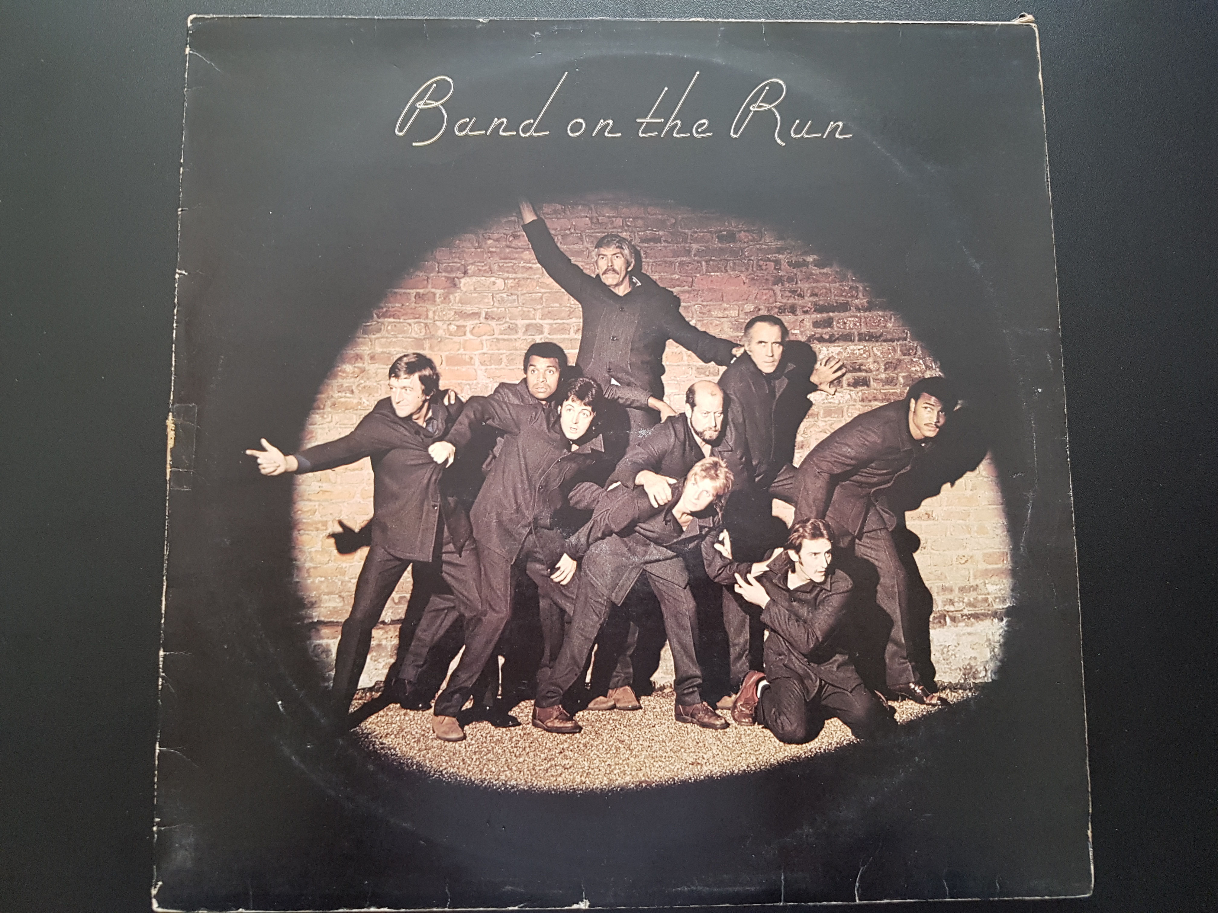 Band on the run with poster