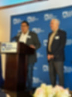 Brian winning Travis County Democratic Party 'Ann McAfee' Award