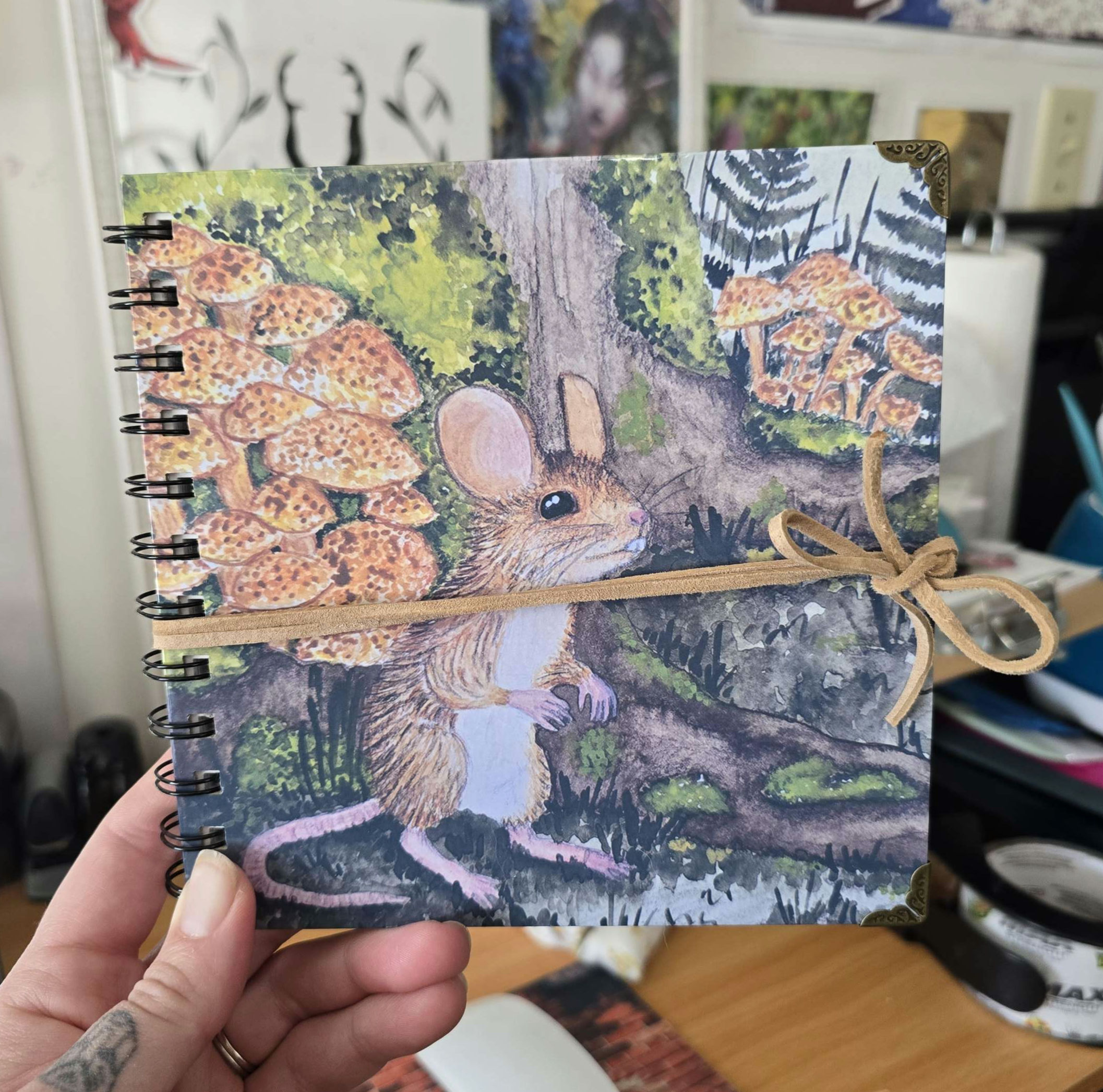 Sketchbook cover with cord wrap