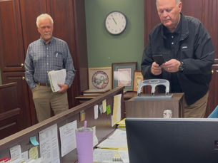 COMMISSIONER ERNEST "RAY' BURNETT AND MR. EDWARD CHEVALLIER ARE THE FIRST ONES TO PAY THE $80 PARKS & RECREATION "AMENITY" FEE.