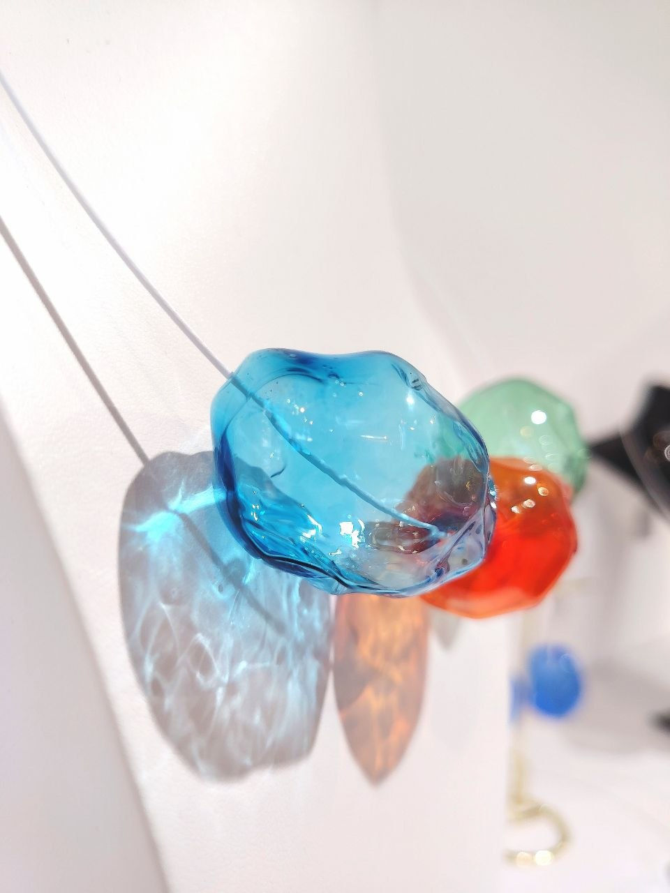 Thumbnail: "Aura Glass" necklace made of hollow crumpled glass beads. Lampwork. 