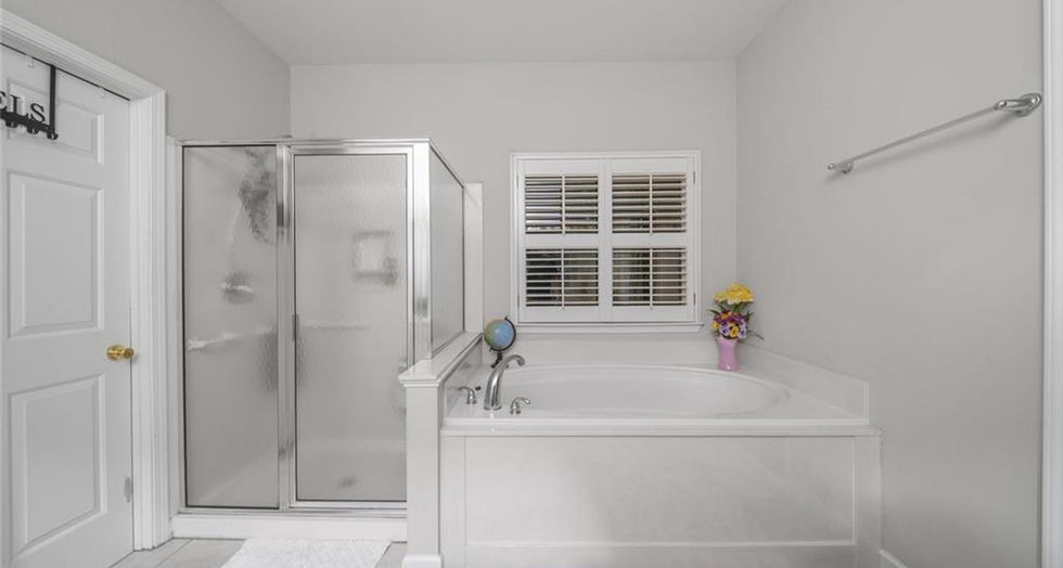 bathroom with shower and vanity in Kennesaw GA home