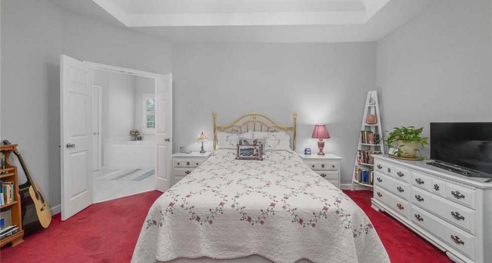 bedroom with window and carpet in Kennesaw GA