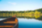 Wooden canoe in a lake