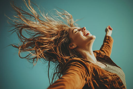 woman-with-windswept-hair-throws-her-head-back-laughter-expressing-unbridled-joy-against-v