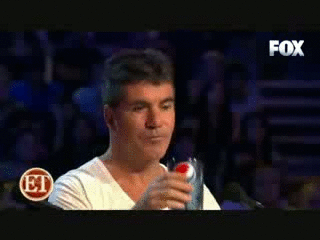 Simon Cowell laughing at the edgy satirical joke that links politicians to a hydraulic component