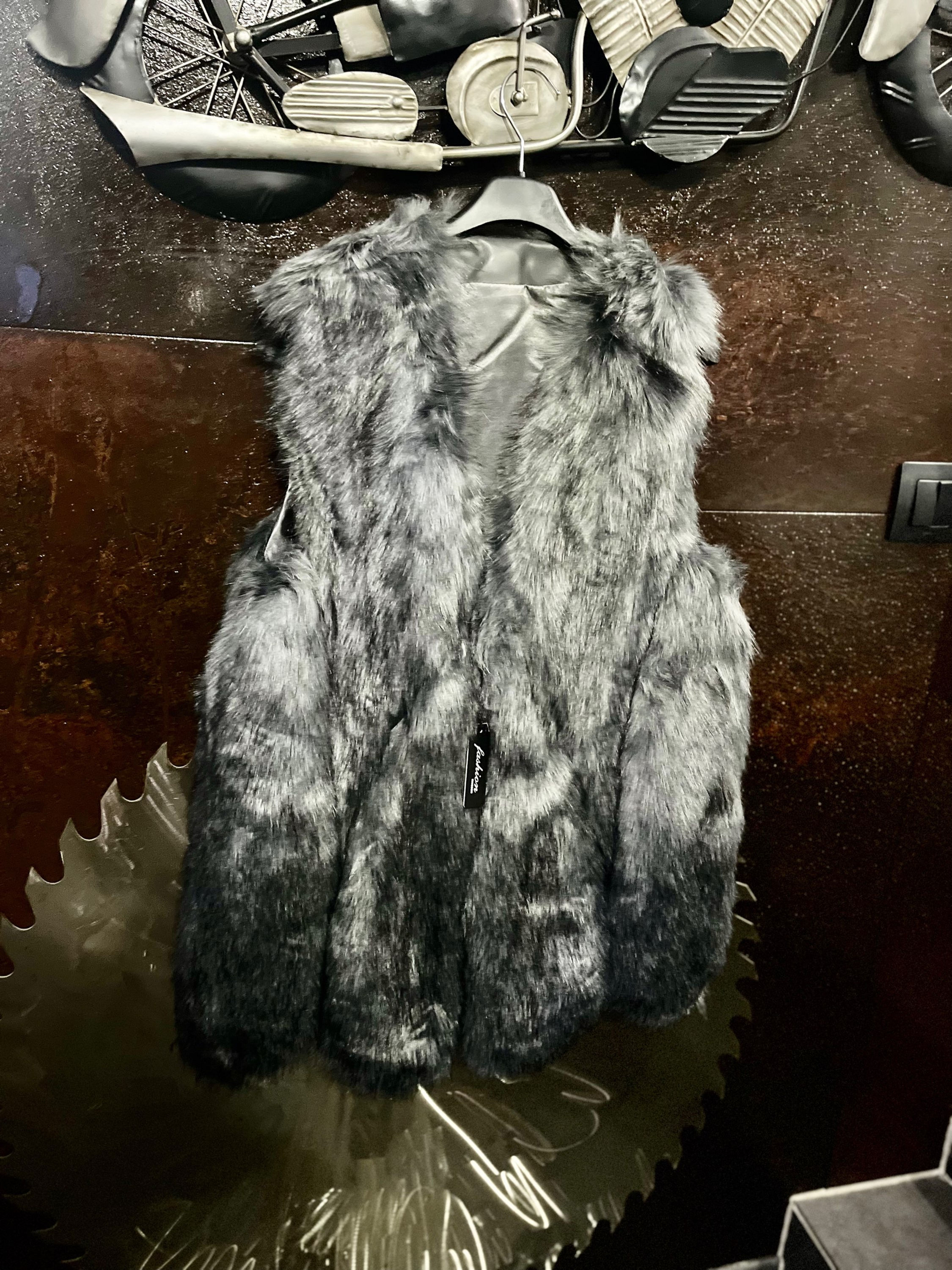 Veste sans manches fourrure grise 