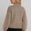 Miniature : Pull taupe torsadé 