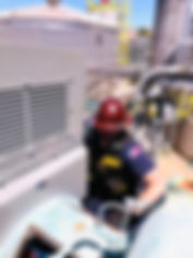 Ace field service team member performing dynamic testing on electric motor on-site