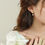 Thumbnail: Asymmetrical Fan Sand Gold Asymmetric Earrings