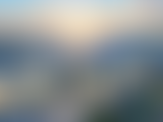 A wide-angle landscape photograph of a modern factory complex with thousands of solar panels on its roof at sunrise, with a sign in the foreground that reads, "SOLAR: A STRATEGIC INVESTMENT FOR FACTORIES."