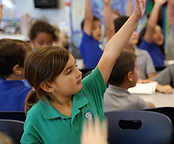 PCA students raising hands