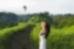 A young beautiful woman walking in Bali, Ubud.