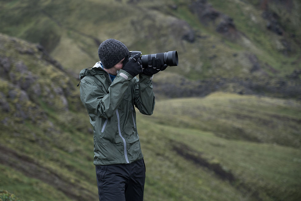 Me shooting longer-focal length landscapes in Iceland.
