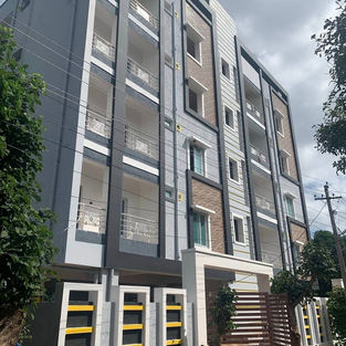 Stilt plus 4 floors apartment building construction with modern elevation in Hyderabad