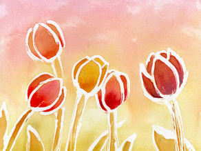 Coloring Rainbows Watercolor Painting of tulips blending yellow, red, and orange.