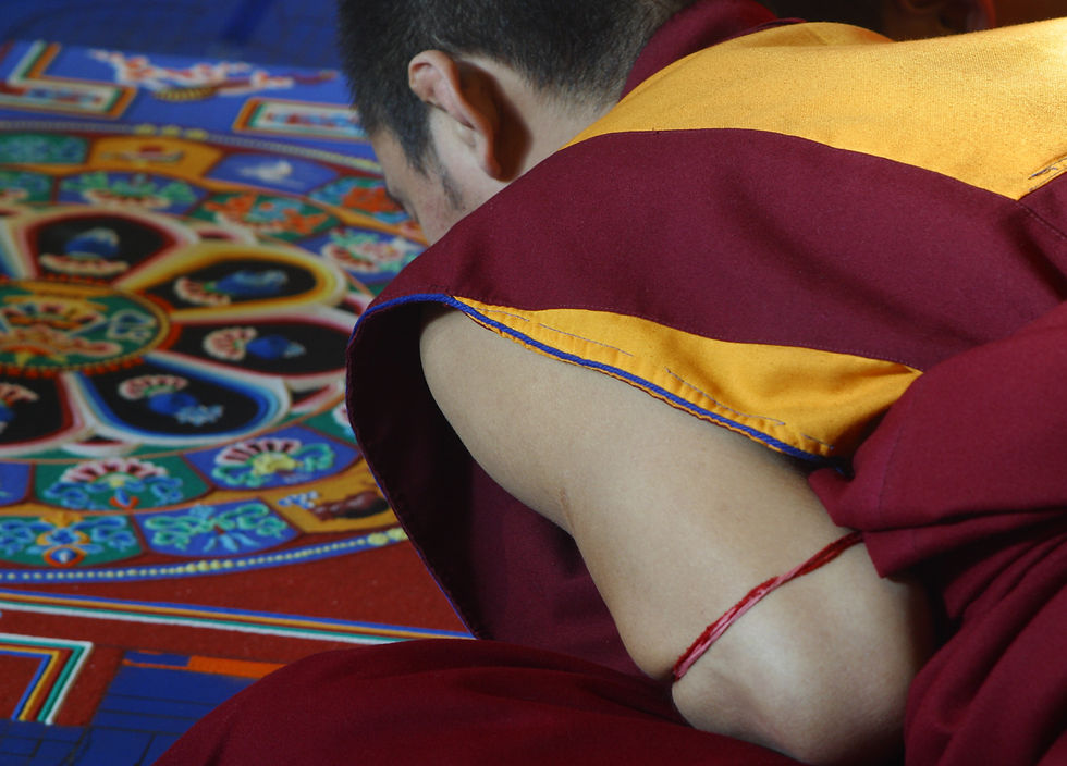 Tibetan Buddhist Monk creating a mandala