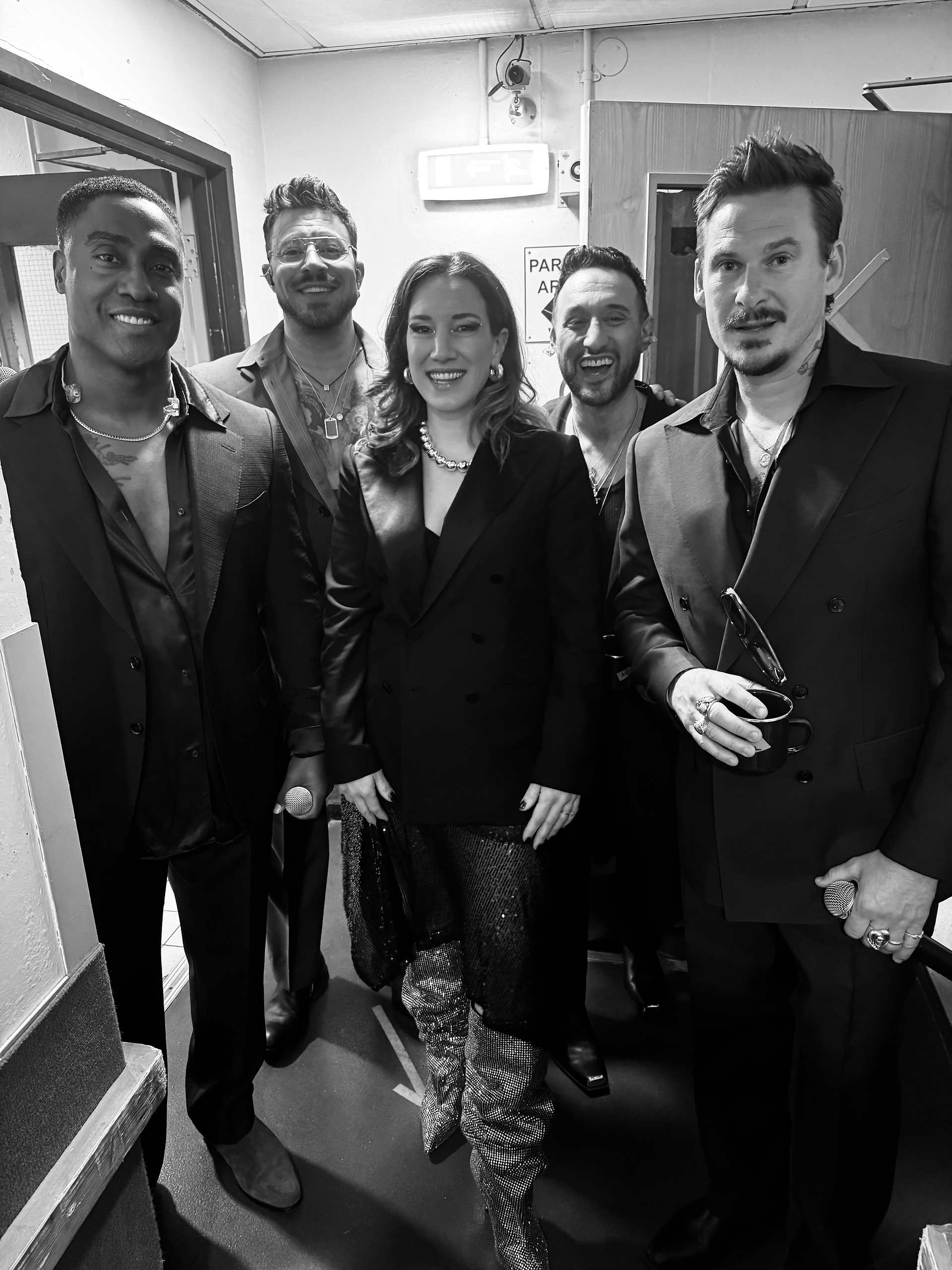 Black and white picture of Mina Simioni singer and Blue boyband