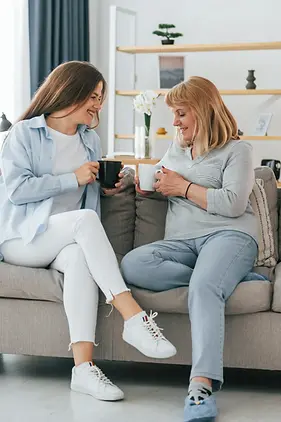 two-women-enjoying-tea-together-at-home-2026-01-09-00-23-19-utc.webp