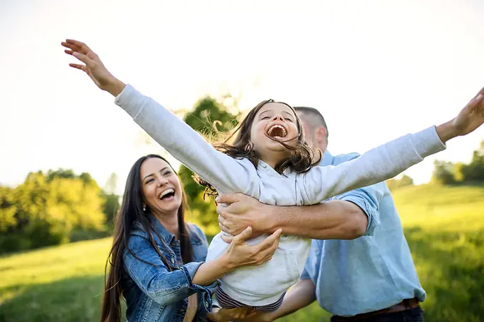 happy-family-with-small-daughter-having-fun-outdoo-2026-03-10-02-10-34-utc.webp