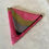 Thumbnail: Triangle coin purse in pink with gold and brown wave pattern