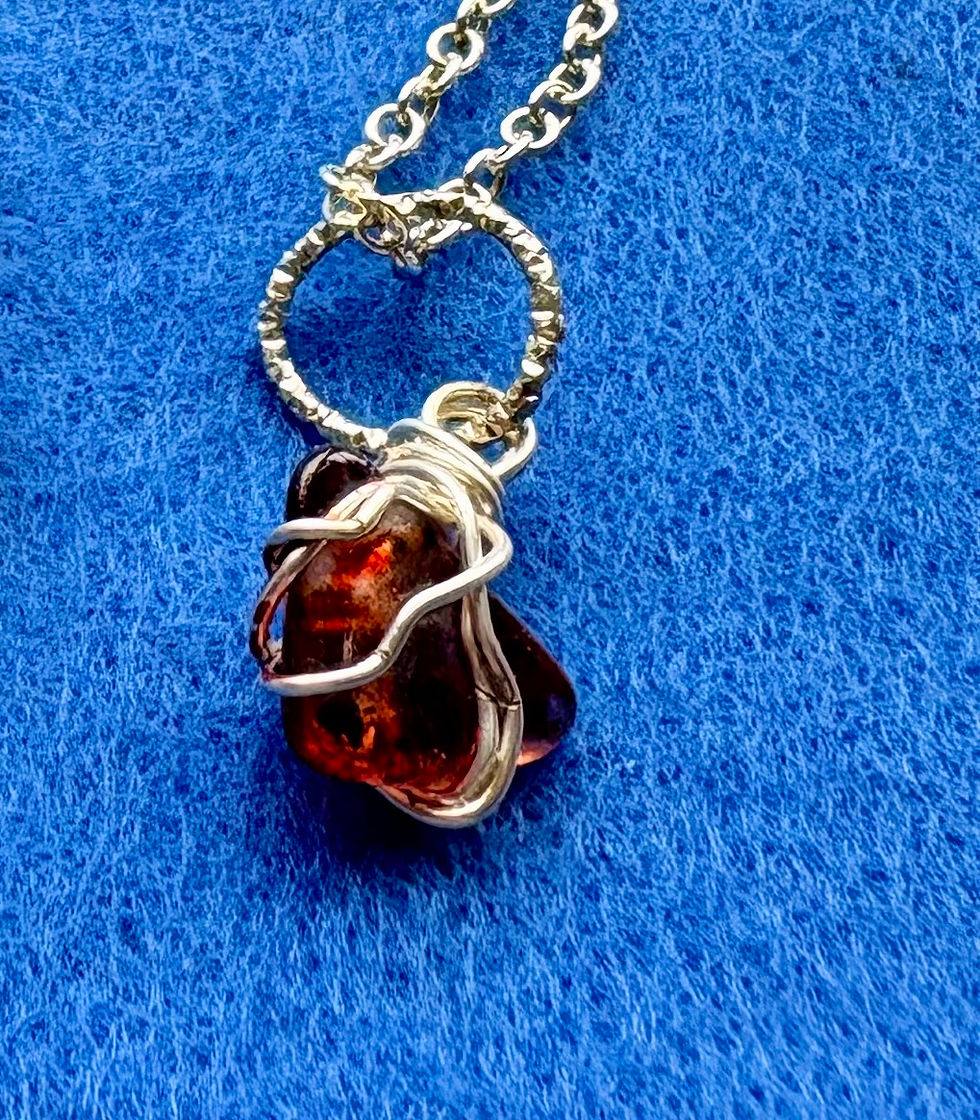 red sea glass necklace close up