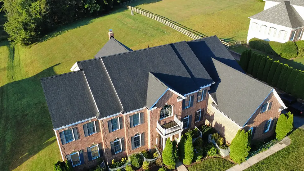 Photo of house showing is roof replacement tax deductible