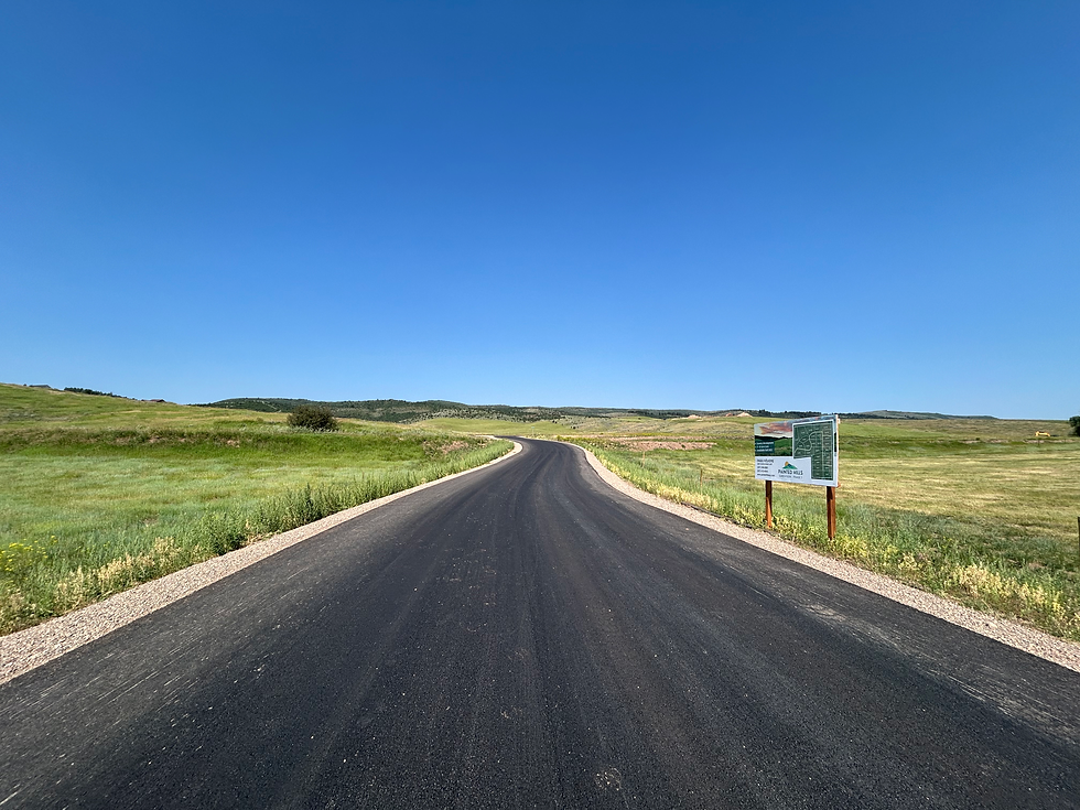 Image of the newly paved road in Painted Hills Subdivision in Afton, WY.