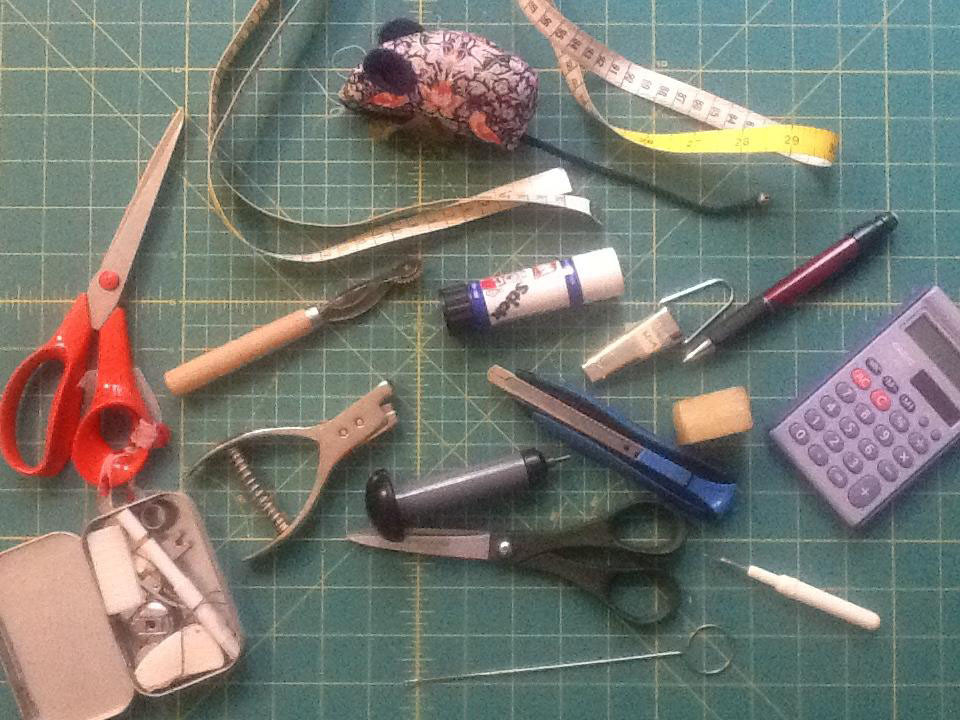 the main tools I use for pattern cutting and sample making including the cutting mat.