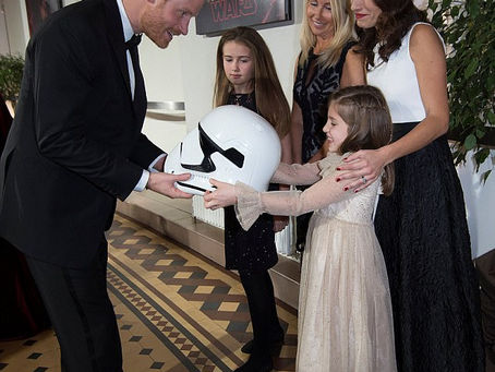 If the shoe fits! Duke of Cambridge flashes velvet smoking slippers on the red carpet before he and