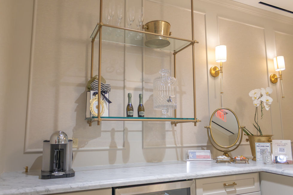 a refreshment area with custom shelves