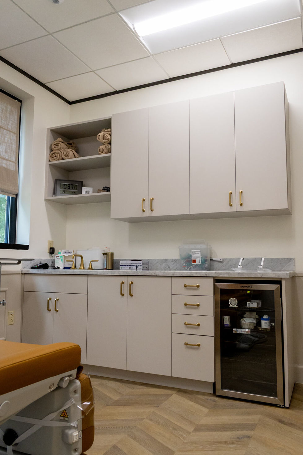 a medical office with custom shelves and cabinets