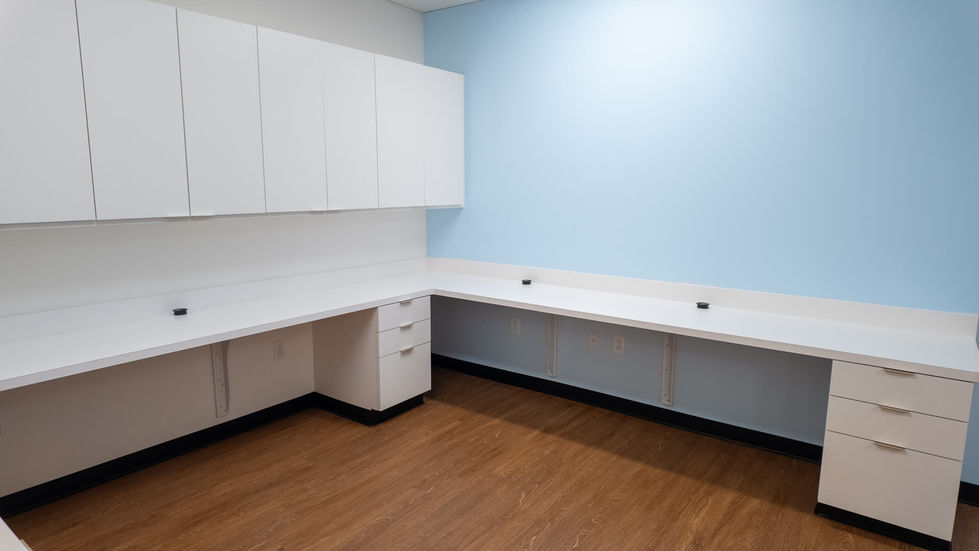 Luxury medical office room with custom cabinets.