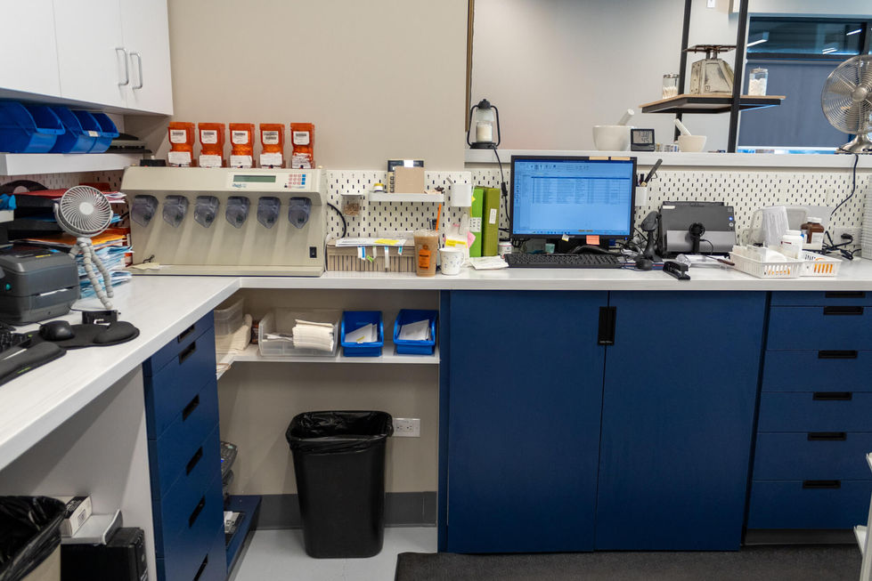 Modern pharmacy with custom drawers.