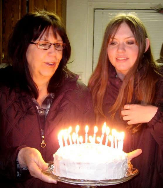 Celebrating my seventeenth birthday with the cake Mom made <3