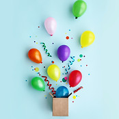 Gift box with ballons and streamers