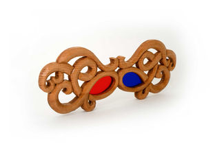 Wooden 3D glasses sculpture from Anaglyphe Beldi by Alexandre Eudier, combining traditional Moroccan motifs with red and blue anaglyph lenses.