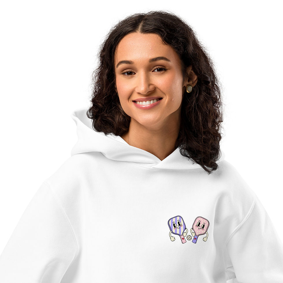 Thumbnail: Person wearing padel hoodie on court relaxed fit sportswear UK