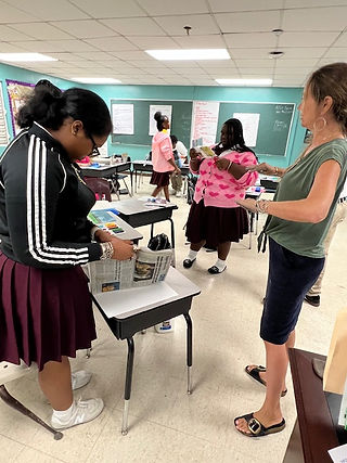 CHS students creating collages with Ms. Morin.