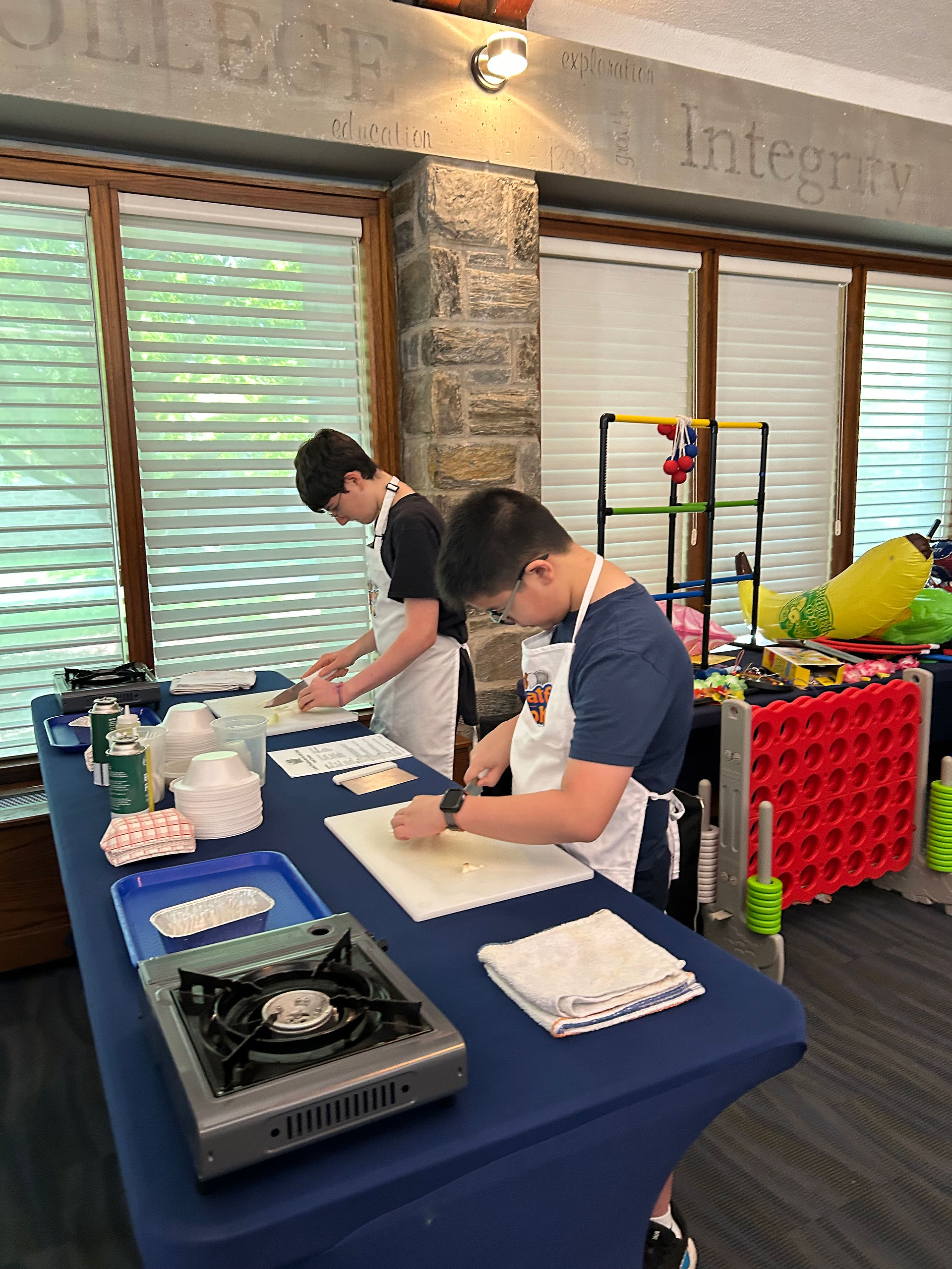 One returning CaC Junior Chef brings a friend to camp to learn various kitchen skills.