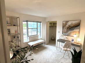 Large Springbrook Cercle den with generous floor space and flexible furniture arrangement options.