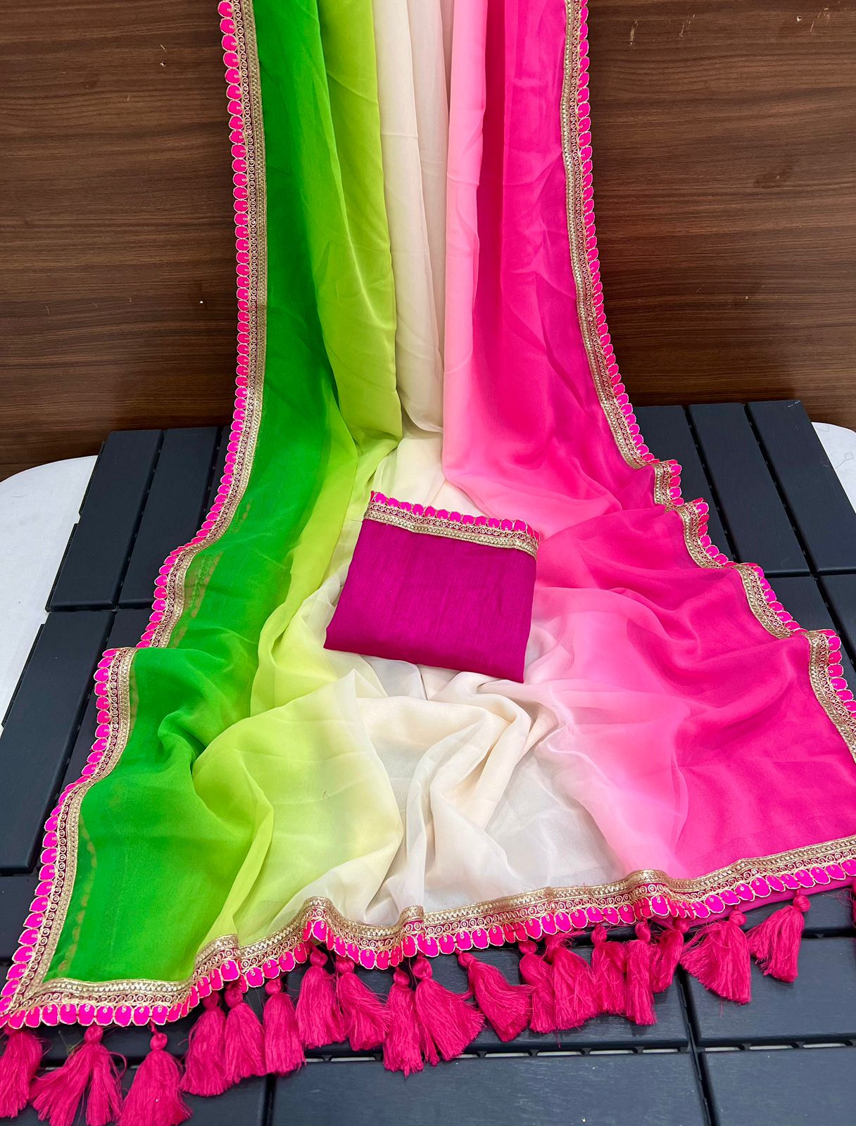 Vibrant Multicolor Faux Georgette Saree with Pink Latkan Detailing