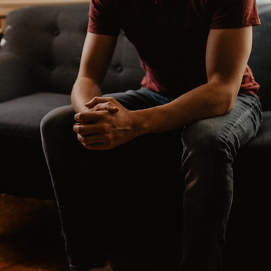 man sitting on sofa_edited